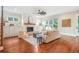 Warm and inviting living area with hardwood floors, fireplace, and ample natural light at 2493 Oostanaula Ne Dr, Brookhaven, GA 30319