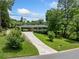 A lovely home with a long driveway, a carport, and a neatly landscaped front yard at 3190 Crestview Circle Nw Cir, Duluth, GA 30096