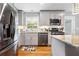 Updated kitchen with stainless steel appliances, stylish countertops, and hardwood floors at 3190 Crestview Circle Nw Cir, Duluth, GA 30096