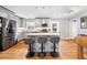 Bright kitchen with stainless steel appliances, island seating, and stylish pendant lights at 3190 Crestview Circle Nw Cir, Duluth, GA 30096