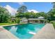 Inviting backyard featuring a sparkling in-ground swimming pool and outdoor seating at 3190 Crestview Circle Nw Cir, Duluth, GA 30096