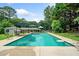 A backyard featuring a private in-ground swimming pool, perfect for outdoor enjoyment and relaxation at 3190 Crestview Circle Nw Cir, Duluth, GA 30096