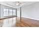 Spacious bedroom with hardwood floors and a large window offering great natural light at 3334 Peachtree Ne Rd # 614, Atlanta, GA 30326