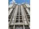 Stunning exterior view of a high-rise condo building with multiple balconies and architectural columns at 3334 Peachtree Ne Rd # 614, Atlanta, GA 30326