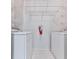 Clean and functional laundry room with washer, dryer, and shelving for storage at 3334 Peachtree Ne Rd # 614, Atlanta, GA 30326