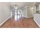 Spacious room featuring gleaming wood floors and great light from the patio doors at 3334 Peachtree Ne Rd # 614, Atlanta, GA 30326