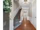 Welcoming entryway with hardwood floors, staircase, and neutral paint palette at 5147 Manerdale Se Dr # 5, Vinings, GA 30339