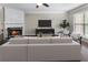 Cozy living room with fireplace, comfortable seating, and neutral decor at 5147 Manerdale Se Dr # 5, Vinings, GA 30339