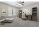 Spacious home office with built-in bookshelves, desk, comfortable chair, and natural light at 5147 Manerdale Se Dr # 5, Vinings, GA 30339