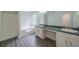 Bright bathroom featuring double vanity, soaking tub, and a separate shower with updated fixtures at 621 Lakewater View Dr, Stone Mountain, GA 30087