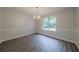 Dining room with contemporary chandelier and view of the backyard at 621 Lakewater View Dr, Stone Mountain, GA 30087