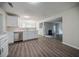 Bright kitchen featuring quartz countertops, stainless appliances, and stylish flooring at 621 Lakewater View Dr, Stone Mountain, GA 30087