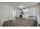 Modern kitchen with stainless appliances and newly installed flooring at 621 Lakewater View Dr, Stone Mountain, GA 30087