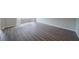 Open-concept floor plan featuring large windows and stylish floors at 621 Lakewater View Dr, Stone Mountain, GA 30087