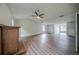 Well-lit living room with modern ceiling fan and beautiful flooring at 621 Lakewater View Dr, Stone Mountain, GA 30087
