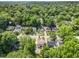 An aerial shot showcases the lush greenery of the neighborhood surrounding the home at 821 Erin Sw Ave, Atlanta, GA 30310