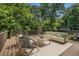 Relaxing outdoor deck with comfortable seating, perfect for enjoying the lush backyard at 821 Erin Sw Ave, Atlanta, GA 30310