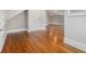 Open bedroom space features hardwood floors and a crisp, neutral wall color at 821 Erin Sw Ave, Atlanta, GA 30310