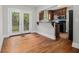 Eat-in kitchen featuring wooden cabinets, stainless appliances, and French doors leading to deck at 821 Erin Sw Ave, Atlanta, GA 30310