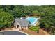 Aerial view of clubhouse with swimming pool and community area at 1012 Chestnut Creek Dr, Villa Rica, GA 30180