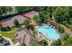 Aerial view showcasing pool, tennis courts, and clubhouse amenities at 1012 Chestnut Creek Dr, Villa Rica, GA 30180
