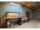 Unfinished basement with a workbench offers potential for customization and additional storage space at 1012 Chestnut Creek Dr, Villa Rica, GA 30180