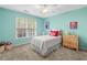 Bright bedroom with window and a small dresser, perfect for a  at 1012 Chestnut Creek Dr, Villa Rica, GA 30180
