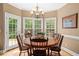 Bright breakfast nook with french doors to the deck, bathed in natural light at 1012 Chestnut Creek Dr, Villa Rica, GA 30180
