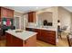 Kitchen features stainless steel appliances, quartz counters, and an island, perfect for meal preparation at 1012 Chestnut Creek Dr, Villa Rica, GA 30180