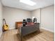 Home office with wood-look floors features a desk, chair, and natural light at 1012 Chestnut Creek Dr, Villa Rica, GA 30180