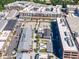 An aerial view of the community featuring commercial and residential buildings at 10565 Highgate Manor Ct, Duluth, GA 30097