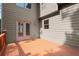 Wooden back deck with a view, gray exterior siding and access to yard at 10565 Highgate Manor Ct, Duluth, GA 30097