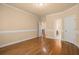 Bedroom with hardwood floors and decorative moldings at 10565 Highgate Manor Ct, Duluth, GA 30097