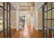 Elegant foyer with hardwood floors, staircase, and open view to the second level at 10565 Highgate Manor Ct, Duluth, GA 30097