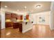 Kitchen featuring an eat-in bar, stainless appliances, and an adjacent dining area at 10565 Highgate Manor Ct, Duluth, GA 30097