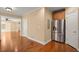 Kitchen with stainless steel refrigerator and wood cabinets at 10565 Highgate Manor Ct, Duluth, GA 30097