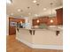 Kitchen featuring custom cabinets, stainless appliances and granite counters at 10565 Highgate Manor Ct, Duluth, GA 30097