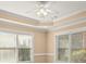 Living room featuring decorative ceiling and bright windows with white blinds at 10565 Highgate Manor Ct, Duluth, GA 30097