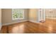 Spacious living room featuring hardwood floors, natural light, and elegant architectural details at 10565 Highgate Manor Ct, Duluth, GA 30097