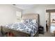 Inviting bedroom with large bed and view to the attached Primary bathroom at 159 Misty Ridge Trl, Stockbridge, GA 30281