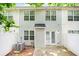 Private patio with a fenced yard, a perfect outdoor retreat, complemented by an efficient AC unit at 6947 Gallant Se Cir # 10, Mableton, GA 30126