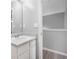 Bright bathroom features a clean white vanity and modern fixtures, with plenty of storage space at 6947 Gallant Se Cir # 10, Mableton, GA 30126