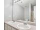 Bathroom featuring dual sinks, vanity, a mirror and shower with a white door at 6947 Gallant Se Cir # 10, Mableton, GA 30126
