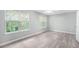 Bright bedroom with new floors and ample sunlight at 6947 Gallant Se Cir # 10, Mableton, GA 30126