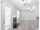 A combined living space features a fireplace, doors, and a ceiling fan at 6947 Gallant Se Cir # 10, Mableton, GA 30126