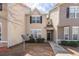 Charming townhome with neutral siding, black shutters, and a small front yard at 7432 Battlecreek Ln, Jonesboro, GA 30236