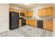 Well-equipped kitchen featuring modern appliances and plenty of cabinet space at 7432 Battlecreek Ln, Jonesboro, GA 30236