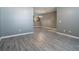 Bright open-concept living area with neutral walls and modern flooring at 7432 Battlecreek Ln, Jonesboro, GA 30236