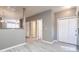 Open living space featuring neutral walls, modern flooring, and connecting areas at 7432 Battlecreek Ln, Jonesboro, GA 30236