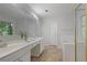 The bathroom offers double sinks, and a tub at 206 Five Iron Nw Ct, Kennesaw, GA 30144